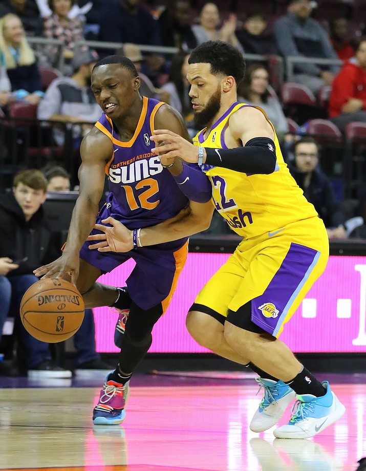 Northern Arizona Suns guard Jared Harper (12) drives past a defender during a game against the South Bay Lakers on Saturday, Dec. 28, 2019, at the Findlay Toyota Center in Prescott Valley. (Matt Hinshaw/NAZ Suns)