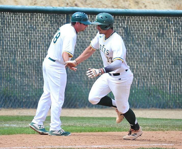 Christian Encarnacion-Strand rounds third after hitting a home run March 26, 2019, in Prescott. The sophomore is looking to have another big season for Yavapai College this spring. (Les Stukenberg/Courier, file)