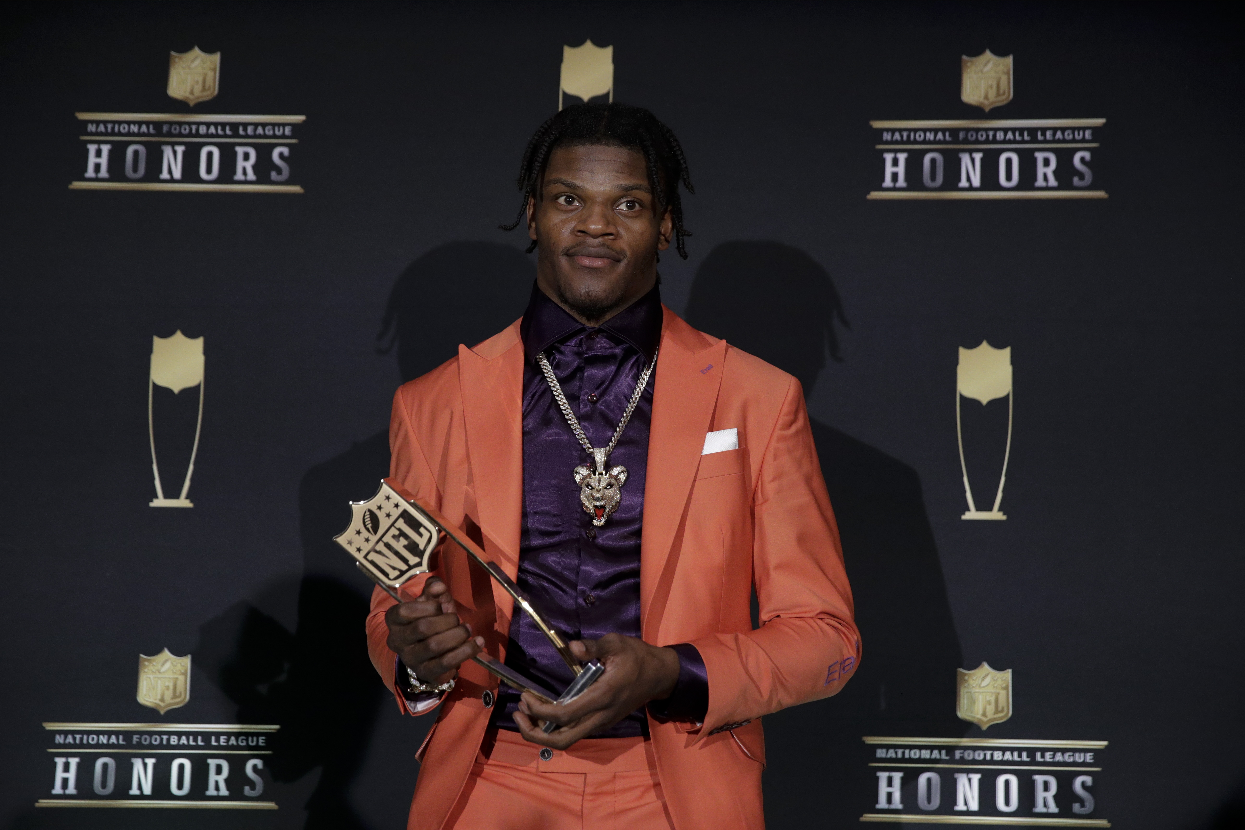 Jackson wins MVP as Ravens take 3 awards; Harbaugh top coach The