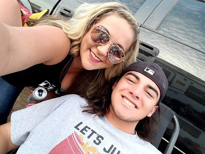 Jake Morales with his half-sister, Aubrey Palguta, are seen at a Bradshaw Mountain High School football game at Bob Pavlich Field in Prescott Valley. Morales played for the Bears as a senior in 2016. (Aubrey Palguta/Courtesy)