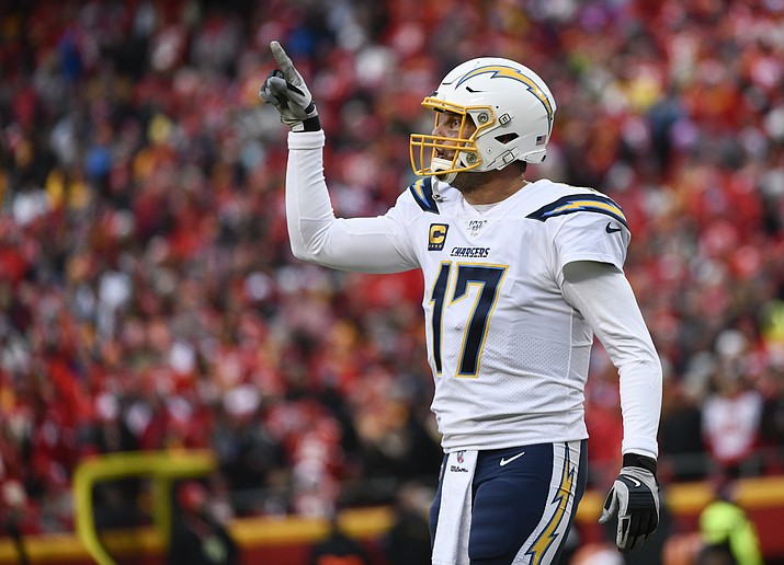 In this Dec. 29, 2019, file photo Los Angeles Chargers quarterback Philip Rivers (17) signals to the bench during the first half of an NFL football game against the Kansas City Chiefs in Kansas City, Mo. Rivers' career with the Los Angeles Chargers has come to an end. The franchise announced Monday, Feb. 10, 2020, that Rivers will enter free agency and not return for the upcoming season. (AP Photo/Reed Hoffmann,File)