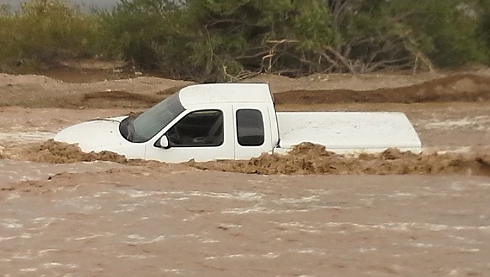 this pickup truck washed down stream during a 2014 flash flood