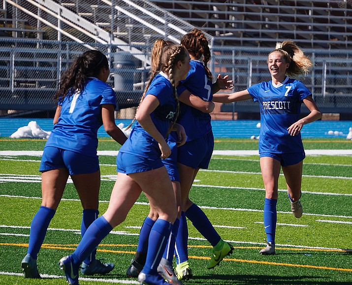 Prescott forward Lily Jensen (7) celebrates with her teammates after the Badgers score a goal during a state playoff game against Mohave on Saturday, Feb. 15, 2020, at Bill Shepard Field in Prescott. (Aaron Valdez/Courier)