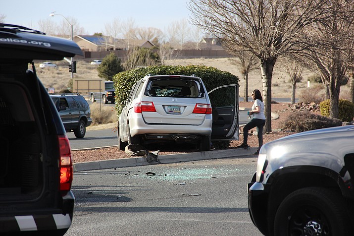 A van involved in a multi-vehicle crash ended up in the median along View Point Dr. in Prescott Valley Tuesday night, Feb. 18, 2020. (Max Efrein/Courier)