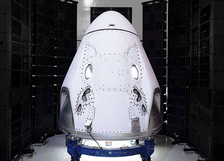 This undated photo made available by SpaceX in February 2020 shows the Crew Dragon spacecraft undergoing acoustic testing in Florida. On Tuesday, Feb. 18, 2020, SpaceX announced it is working with Space Adventures Inc. to take tourists into a high orbit. Ticket prices aren't being divulged but are likely to be in the millions of dollars. (SpaceX via AP)