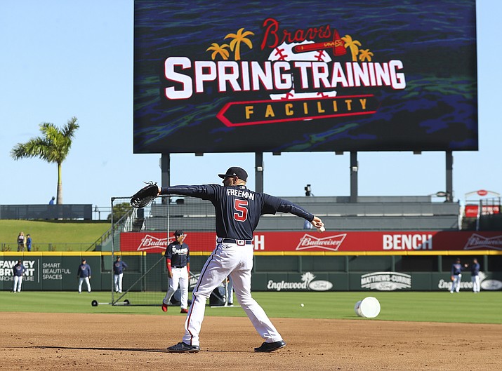 Atlanta Braves first baseman Freddie Freeman and the team take batting practice while preparing to play the Baltimore Orioles in a spring game at the Braves new facility CoolToday Park on Saturday, Feb. 22, 2020, in North Port, Fla.  (Curtis Compton/Atlanta Journal-Constitution via AP)