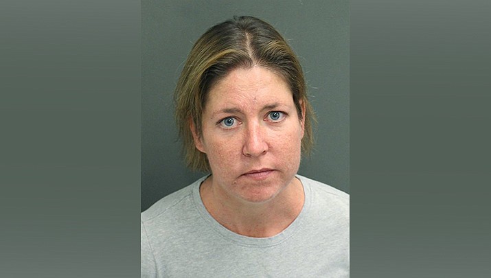 This Monday, Feb. 24, 2020 booking photo from the Orange County Sheriff’s Office shows Sarah Boone. Boone is accused of zipping her boyfriend into a suitcase, recording his repeated cries for help and leaving him locked inside until he died, according to sheriff's office documents. (Orange County Sheriff’s Office via AP)
