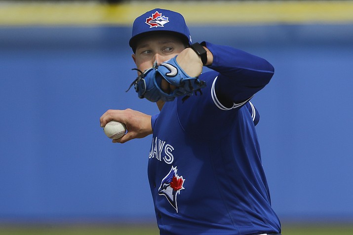 Toronto Blue Jays’ Nate Pearson delivers a pitch during live batting practice at a spring training workout Friday, Feb. 21, 2020, in Dunedin, Fla. (Frank Franklin II/AP)