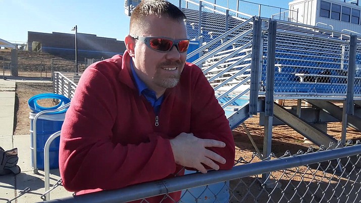 ABOVE: Former Chino Valley High School football coach Wade Krug looks out at the football field Tuesday, Feb. 25, 2020, nearly one month after he stepped down as the team’s coach to spend more time with family. (Jason Wheeler/Courier)