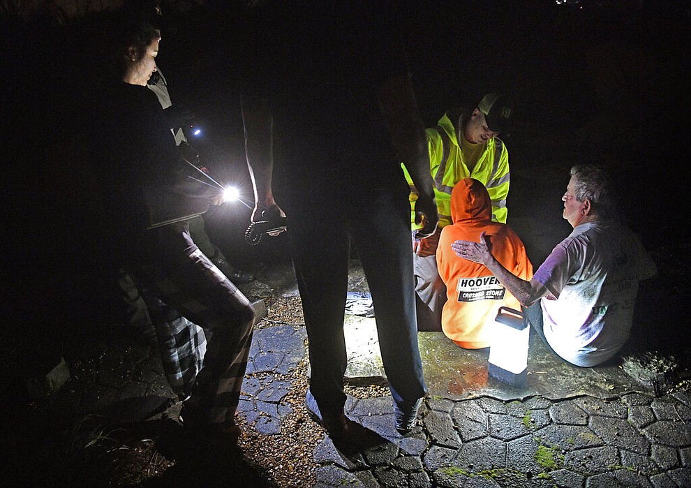 Bill and Shirley Wallace sit to recover after being freed from their home that collapsed and trapped them under rubble after a tornado hit Mt. Juliet, Tenn., Tuesday, March 3 2020. (Larry McCormack/The Tennessean via AP)