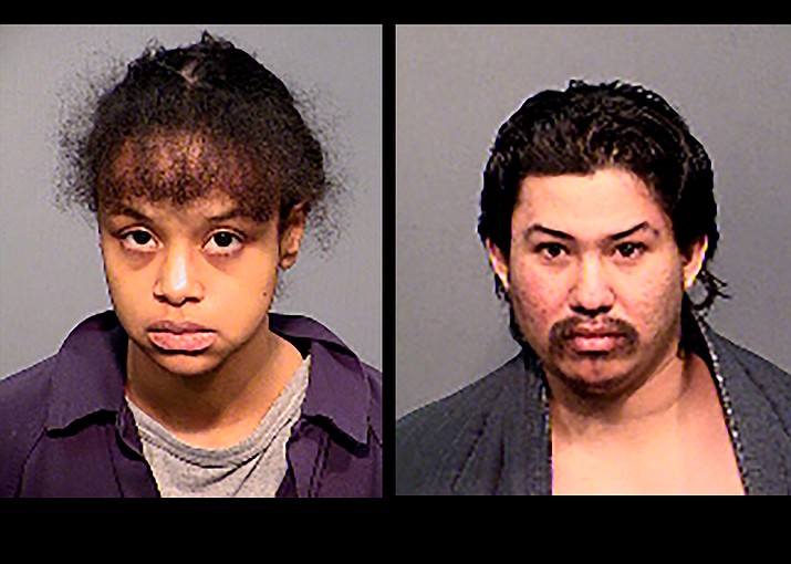 This undated booking photo provided by the Flagstaff Police Department shows Elizabeth Archibeque-Martinez and Anthony Martinez. Archibeque-Martinez, Anthony Martinez and Ann Marie Martinez, the parents and grandmother of a 6-year-old Arizona boy found dead in his home from apparent malnourishment, have been arrested on suspicion of murder and child abuse, police said Tuesday, March 3. (Flagstaff Police Department via AP)