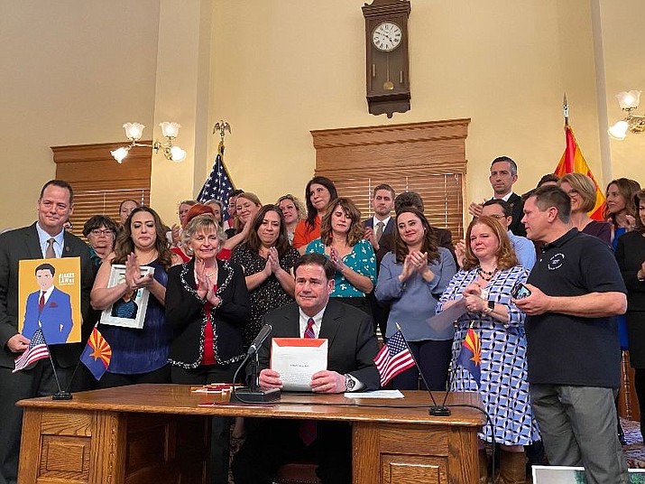 Arizona lawmakers and Gov. Doug Ducey on Tuesday, March 3, approved legislation aimed at preventing teenage suicides and requiring insurance companies to pay for mental health care under the same rules that apply to physical ailments. (Office of the Governor/Courtesy)