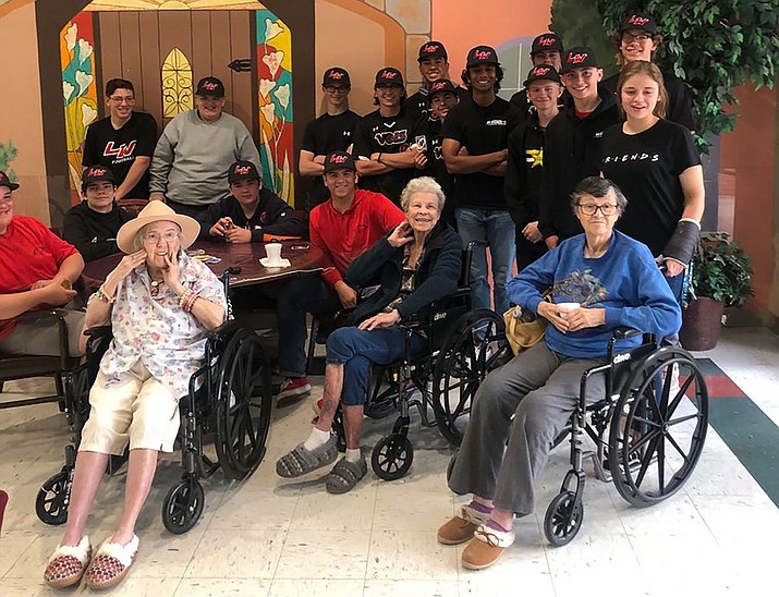 Members of the Lee Williams High School baseball team visited The Lingenfelter Center for Alzheimer’s Care to hang out as well as play dominoes and UNO. (Courtesy photo)