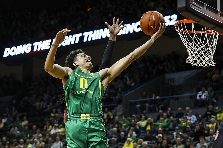 Oregon guard Will Richardson (0) lays in a basket against Stanford during the first half of an NCAA college basketball game in Eugene, Ore., Saturday, March 7, 2020. (Thomas Boyd/AP)