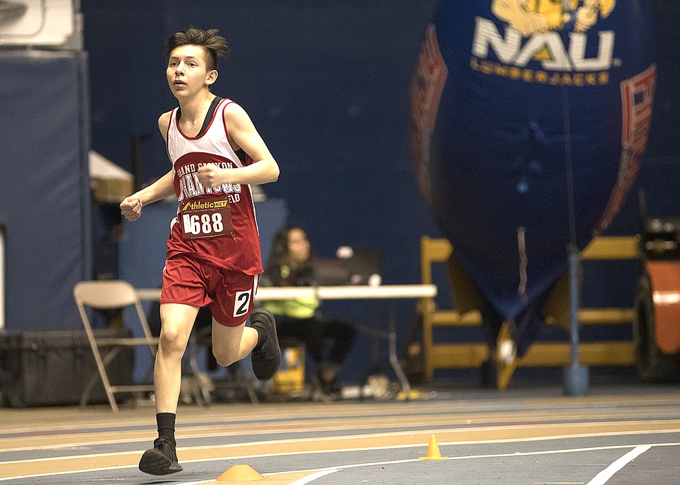 Heading into the home stretch, freshman Jafet Torres on the 800 meter. Torres threw himself over the finish line to beat his opponent. (V. Ronnie Tierney/WGCN)