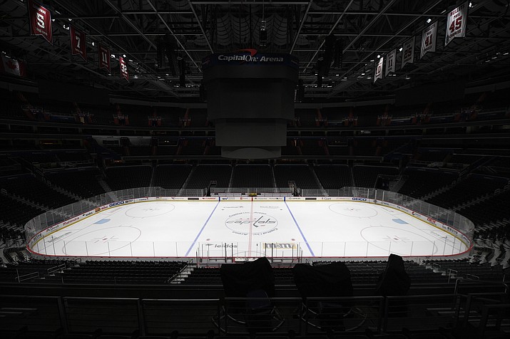 The Capital One Arena, home of the Washington Capitals NHL hockey club, sits empty Thursday, March 12, 2020, in Washington. The NHL is following the NBA’s lead and suspending its season amid the coronavirus outbreak, the league announced Thursday. (Nick Wass/AP)