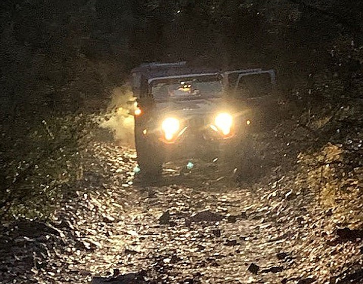 Members of Yavapai County Sheriff’s Office’s Search and Rescue Team’s 4X4 unit drive along Forest Service Road 413 on Mingus Mountain to assist stranded motorists on Wednesday, March 11, 2020. (YCSO/Courtesy)