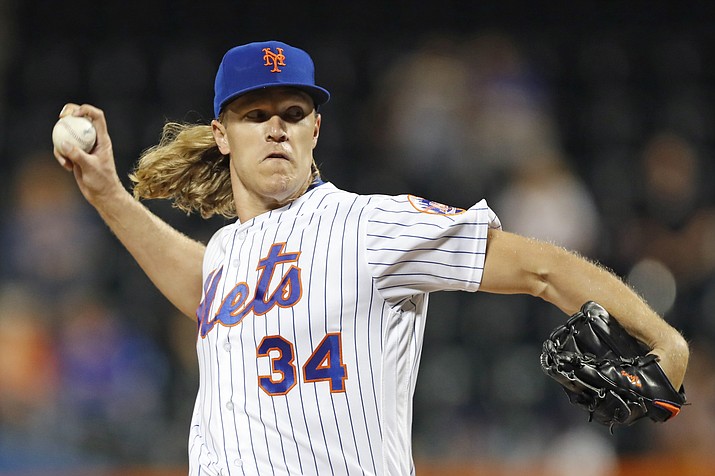 In this Sept. 24, 2019, photo, New York Mets starting pitcher Noah Syndergaard winds up during the first inning of the team’s baseball game against the Miami Marlins in New York. (Kathy Willens/AP, file)