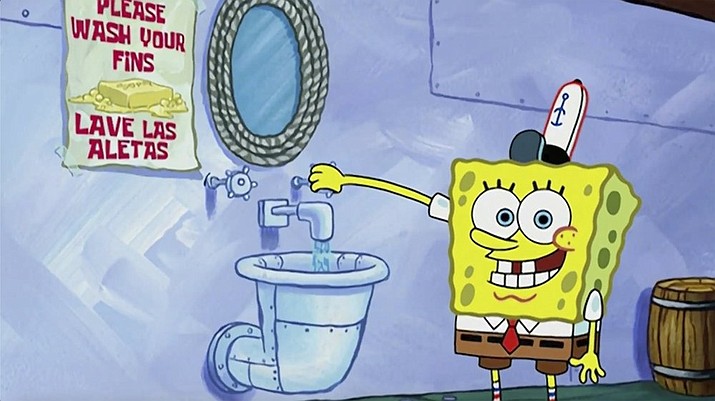 This image released by Nickelodeon shows animated character SpongeBob SquarePants demonstrating effective hand washing in a video to be shown on Nickelodeon’s cable and digital platforms. Nickelodeon is airing a special with a “kid’s-eye view” of the coronavirus pandemic to address youngsters' concerns and help families weather the crisis, the channel said Friday. The special, also showing on TeenNick and Nicktoons, is part of the #KidsTogether initiative that launched this month and enlists familiar Nick faces to help people stay healthy and active. (Nickelodeon via AP)