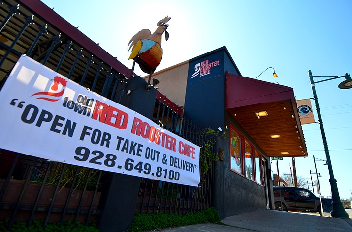 Shane Smith, one of the owners of the Red Rooster in Old Town Cottonwood, said they are doing takeout, but their hours are fluctuating and customers should check their Facebook page. VVN/Vyto Starinskas