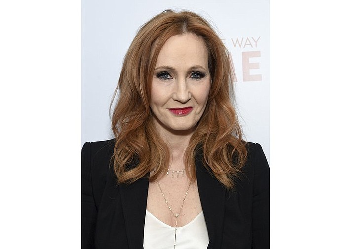 This Dec. 11, 2019 file photo shows J.K. Rowling, author of the "Harry Potter" book series, at the premiere of "Finding the Way Home" in New York. The author has launched an online initiative, www.harrypotterathome.com, which features quizzes, games and other activities. For the month of April, Rowling also has partnered with the audio publisher-distributor Audible and the library e-book supplier OverDrive for free audio and digital editions of the first Potter book, “Harry Potter and the Philosopher's Stone.” The U.S. edition is called “Harry Potter's and the Sorcerer's Stone”. (Photo by Evan Agostini/Invision/AP)