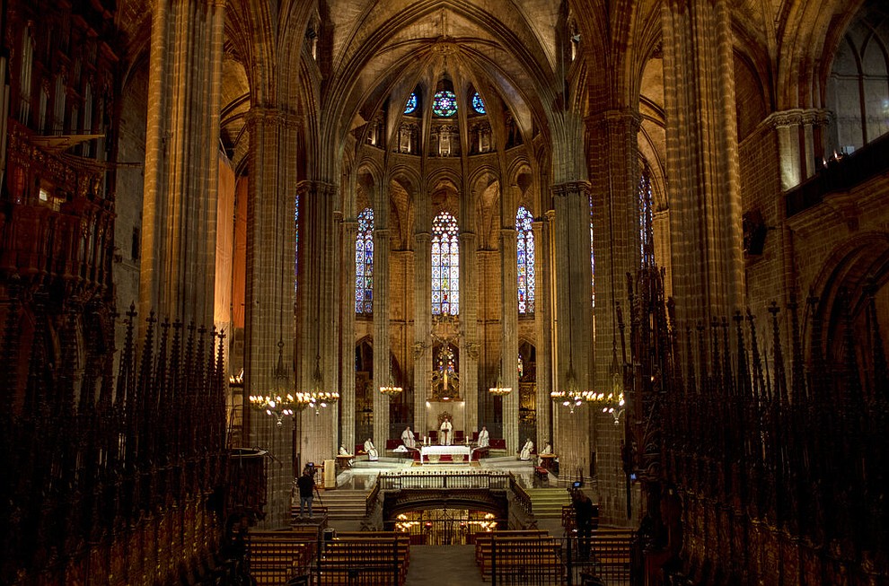 Cardinal Omella, centre, is surrounded by bishops as they celebrate the Holy Thursday Mass at the empty Barcelona Cathedral, Spain, Thursday, April 9, 2020. COVID-19 causes mild or moderate symptoms for most people, but for some, especially older adults and people with existing health problems, it can cause more severe illness or death. (AP Photo/Emilio Morenatti)