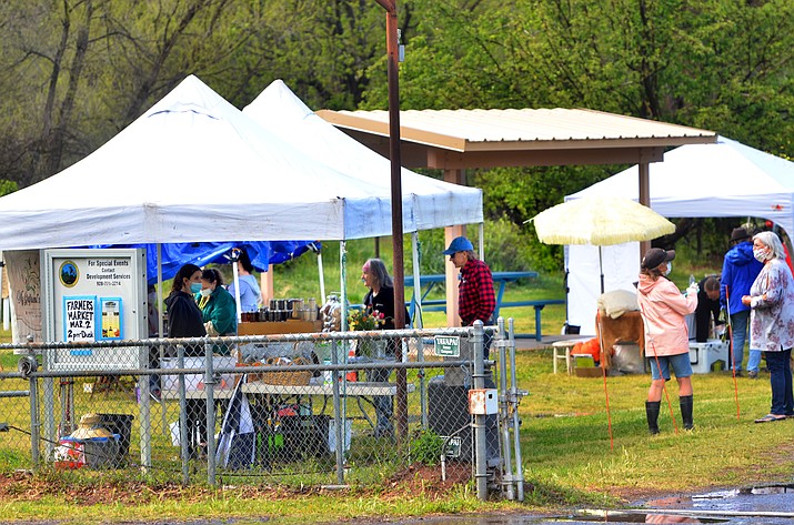 The Cornville Farmers Market was open Monday afternoon even during brief showers. VVN/Vyto Starinskas