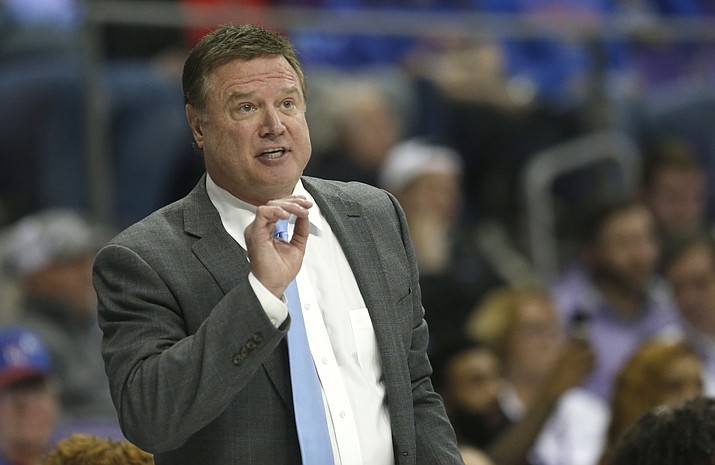 In this Feb. 8, 2020, file photo, Kansas head coach Bill Self reacts as Kansas plays TCU during the second half of an NCAA college basketball game in Fort Worth, Texas. The NCAA transfer portal was implemented two years ago, intended to help ease the burden on administrators, increase transparency and empower athletes who complained about being prevented at times from going elsewhere. “There’s a lot of juggling that has to take place because of the transfer portal,” said Kansas coach Bill Self, who lost elite guard Isaac McBride to Vanderbilt but enjoyed the benefit of getting sharp-shooter Isaiah Moss from Iowa this past season. (Ron Jenkins/AP, file)