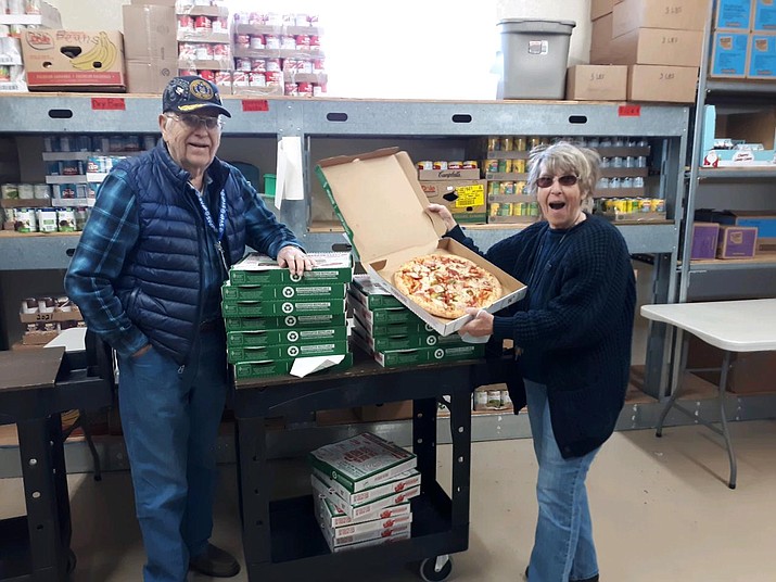 Papa John’s in Prescott and Prescott Valley have been donating pizzas to local entities, such as the Salvation Army, pictured here this past Tuesday, and the YMCA. Groups can contact them on Facebook @papajohnsprescott and @papajohnsprescottvalley. (Courtesy)
