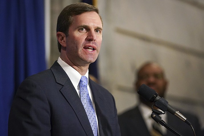 In this file photo, Kentucky Governor Andy Beshear speaks at a 2019 press conference. This week as he spoke about the state trying to process unemployment claims Beshear told the media a few “bad apples” including a person who filed an unemployment claim under the name of rapper Tupac Shakur — who was killed in a 1996 shooting — are responsible for slowing down the state’s unemployment processing. It turns out a real man named Tupac Malik Shakur had lost his job working as a cook and filed the claim. (AP Photo/Bryan Woolston)
