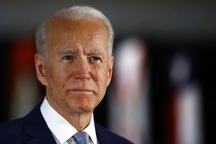 In this March 10, 2020, file photo Democratic presidential candidate former Vice President Joe Biden speaks to members of the press at the National Constitution Center in Philadelphia. (AP Photo/Matt Rourke, File)