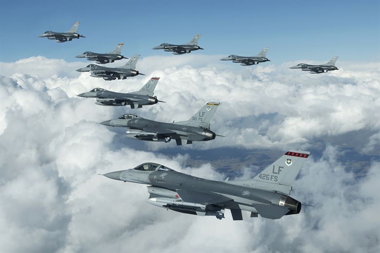 F-16 Fighting Falcons fly overhead during the New York Jets