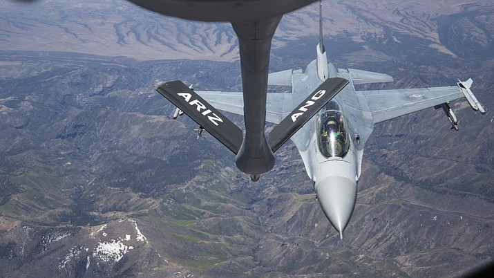 An F-16 Fighting Falcon from the Arizona Air National Guard’s 162nd Wing in Tucson trails behind a KC-135 Stratotanker from Air Guard’s 161st Air Refueling Wing during a flyover of northern Arizona on Thursday, May 7, 2020. The flyover, which was in tribute to the nurses and healthcare works on the front lines of the fight against COVID-19, was combined with an air refueling mission. (Arizona National Guard photo by Sgt. 1st Class Brian A. Barbour/Courtesy)