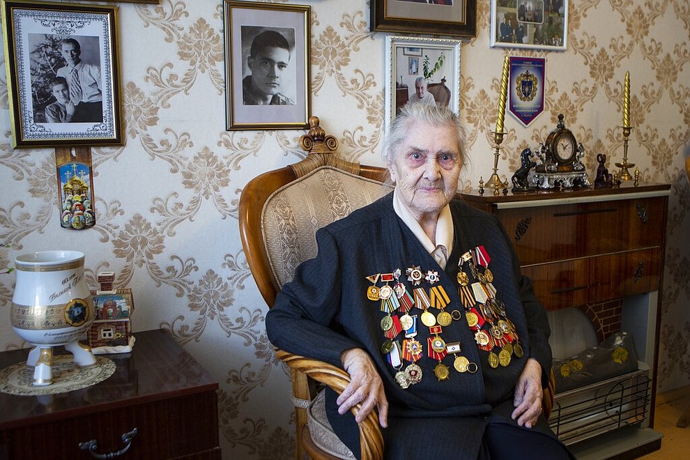 In this photo taken on Thursday, April 30, 2020, Valentina Efremova, a 96-year-old World War II veteran, who served as a nurse in field hospitals on the frontlines throughout the war, speaks during her interview with the Associated Press in Yakutsk, Russia . (AP Photo/Alex Lee)