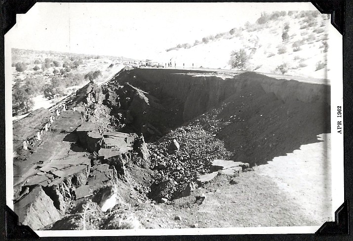 People gather around a cave-in on Route 66 between Ash Fork and Williams in 1962. (Photo/Messimer family)