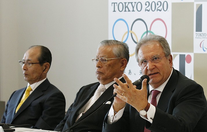 In this Friday, Aug. 7, 2015 photo, World Baseball Softball Confederation President Riccardo Fraccari, right, accompanied by Japanese baseball legend Sadaharu Oh, left, and Nippon Professional Baseball Commissioner Katsuhiko Kumazaki, speaks to the media at a press conference in Tokyo. For World Baseball Softball Confederation president Riccardo Fraccari, it seems like such a sure home run that he can’t even imagine why anyone wouldn’t want to be involved. No wonder the refusal of Major League Baseball and its players' association to send top stars to the Tokyo Games has frustrated Fraccari for years. Now, with the Olympics postponed for a full year due to the coronavirus pandemic, and the current MLB season on hold, Fraccari has the unexpected opportunity to make one final pitch to the sport’s biggest league. (Ken Aragaki/AP, File)