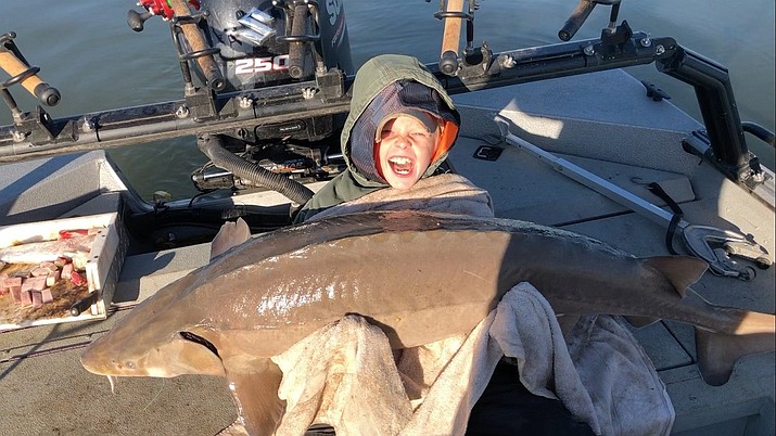 Coye Price was eager to catch something big after his 11-year-old sister Caitlin hooked a 40-pound striper and his 8-year-old sister Farrah reeled in a 58-pound blue catfish a while back, the Tennessee Wildlife and Resource Agency said Tuesday in a Facebook post. (Tennessee Wildlife Resources Agency)