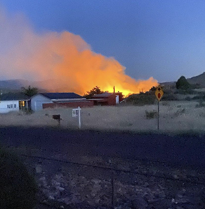 A fire that ultimately spread across five acres in the Cordes Lakes area Thursday, May 21, 2020, lights up the area. (YCSO/Courtesy)