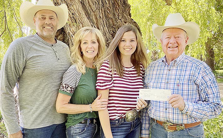 Brynley Taylor was recently honored for her Best Bred and Fed Steer shown at the 2020 Verde Valley Virtual Fair. Andy Groseta, YCGA past president, right, presented a $1,000 check to Taylor on May 18 at the W Dart Ranch in Cottonwood. Also pictured are Taylor’s parents, Scott and Natalie Taylor.