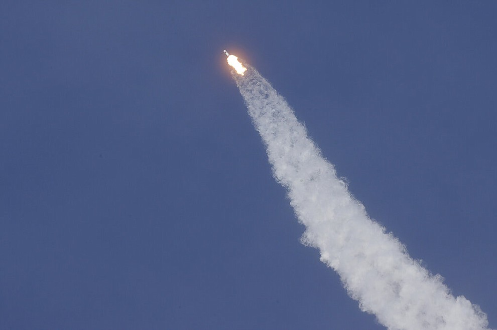 The SpaceX Falcon 9 and the Crew Dragon capsule, with NASA astronauts Bob Behnken and Doug Hurley onboard, lifts off Saturday, May 30, 2020, at the Kennedy Space Center in Cape Canaveral, Fla. (AP Photo/Chris O'Meara)