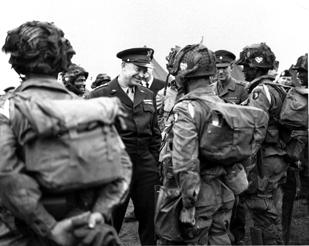 In this image provided by the U.S. Army Signal Corps, General Dwight Eisenhower gives the order of the day, "Full Victory - Nothing Else," to paratroopers somewhere in England just before they board their planes to participate in the first assault in the invasion of the continent of Europe, June 6, 1944. (AP Photo/U.S. Army Signal Corps Photo)