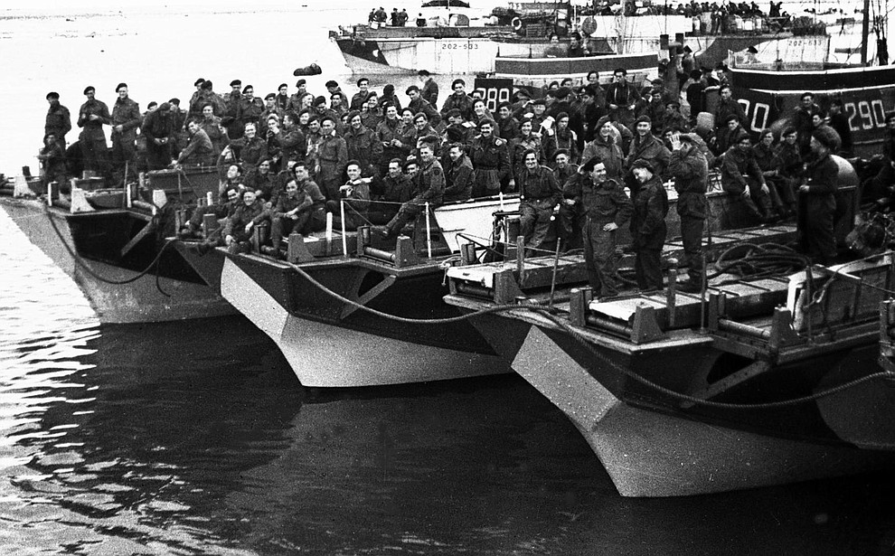 British Commandoes assemble at a coastal port in England, June 4, 1944, in readiness for sailing to France for the liberation of Europe. (AP Photo/British Official Photo)..