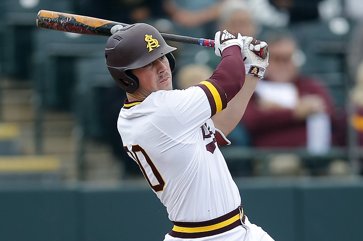 In this Feb. 17, 2019, file photo, Arizona State's Spencer Torkelson bats during an NCAA college baseball game against Notre Dame in Phoenix. Detroit drafted Arizona State first baseman Spencer Torkelson with the top pick in this week's draft, although the Tigers plan to try him across the diamond at third base. (Rick Scuteri/AP, file)