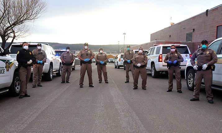 Above: Officers with the Navajo Police Department in Window Rock, Arizona, report for duty. The Navajo Police Department reported 13 officers have tested positive for COVID-19. Four officers remain in isolation and nine have recovered and returned to duty. On June 19, Officer Michael Lee with the Chinle District passed away because of COVID-19. On June 15, 25 recruits reported to the Navajo Police Training Academy in Chinle, Arizona to begin a 15-week academy. (Photos/Navajo Police Department)