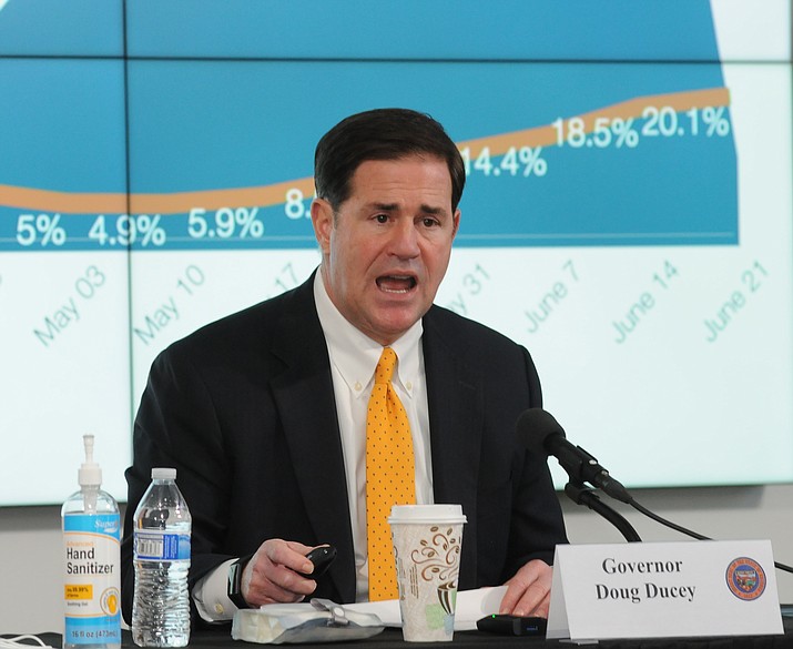 Gov. Doug Ducey discusses Thursday, June 25, 2020, the increasing number of Arizonans infected with COVID-19 and how the only way to turn that around is more people staying home and wearing face masks. (Howard Fischer/Capitol Media Services)