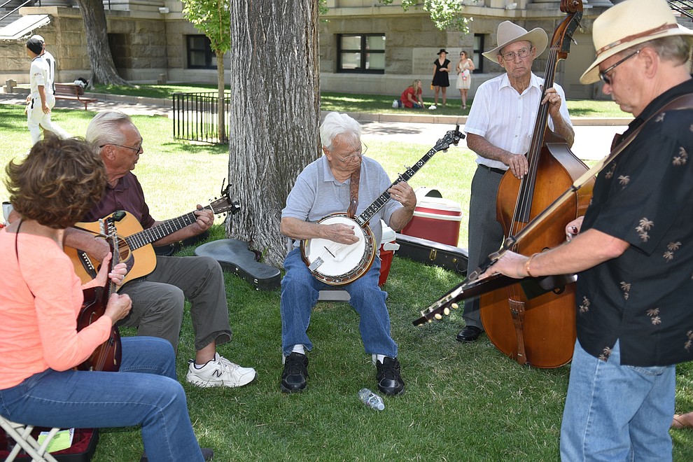 Another side jam takes place on the other side of the courthouse lawn during the Prescott Bluegrass Festival at the Yavapai County Courthouse on Saturday afternoon, June 27, 2020. (Jesse Bertel/Courier)