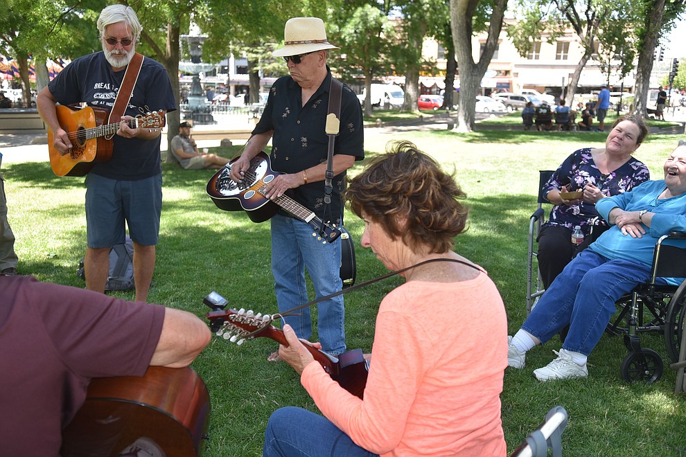 Another side jam takes place on the other side of the courthouse lawn during the Prescott Bluegrass Festival at the Yavapai County Courthouse on Saturday afternoon, June 27, 2020. (Jesse Bertel/Courier)