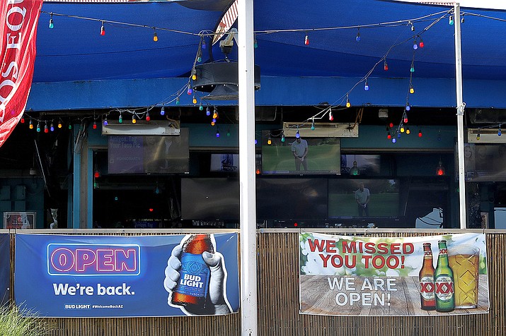 A sports bar is empty before it closed early Monday, June 29, 2020, in Phoenix. Arizona Gov. Doug Ducey has shut down bars, movie theaters, gyms and water parks amid a dramatic resurgence of coronavirus cases. (Matt York/AP)
