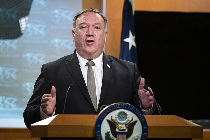 Secretary of State Mike Pompeo, speaks during a news conference at the State Department, Wednesday, July 1, 2020, in Washington. The Trump administration has formally notified the United Nations of its withdrawal from the World Health Organization, although the pullout won’t take effect until next year, meaning it could be rescinded under a new administration or if circumstances change. (Manuel Balce Ceneta, AP Pool)