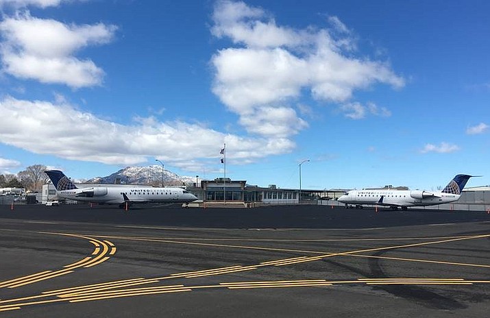 SkyWest/United Express planes sit ready for passengers at the Prescott Regional Airport. The carrier has agreed to continue locally through 2023. (Courtesy)
